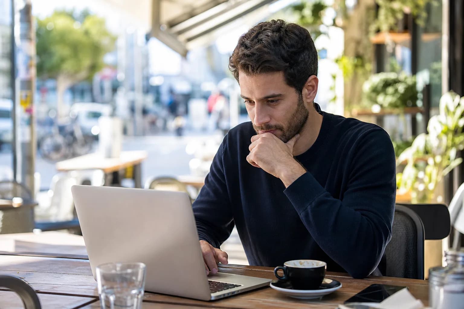 A small business owner reviewing their advertising costs in the Facebook Ads Manager.